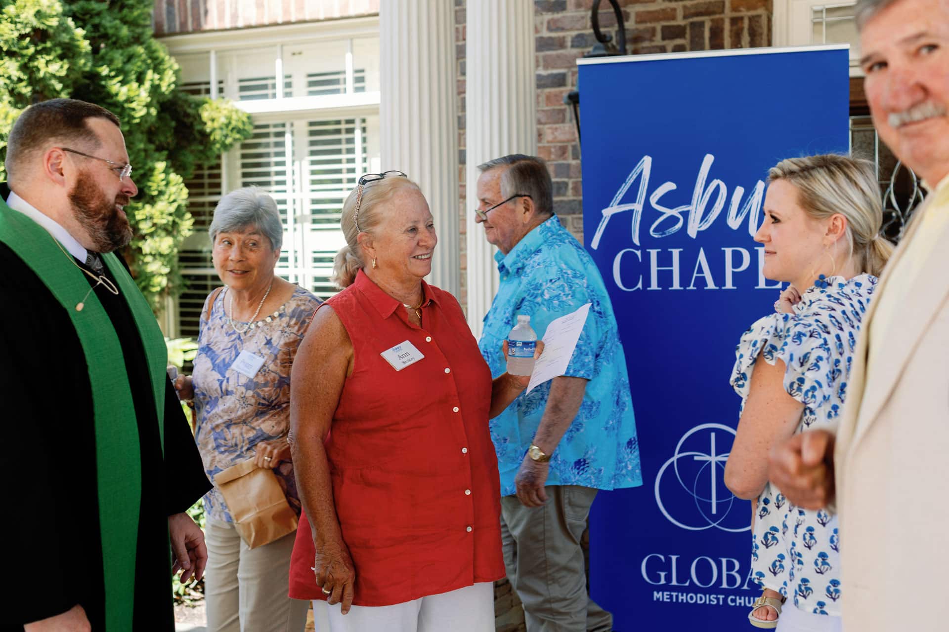 People attending service at Asbury Chapel, Gainesville's home for Methodist Tradition.